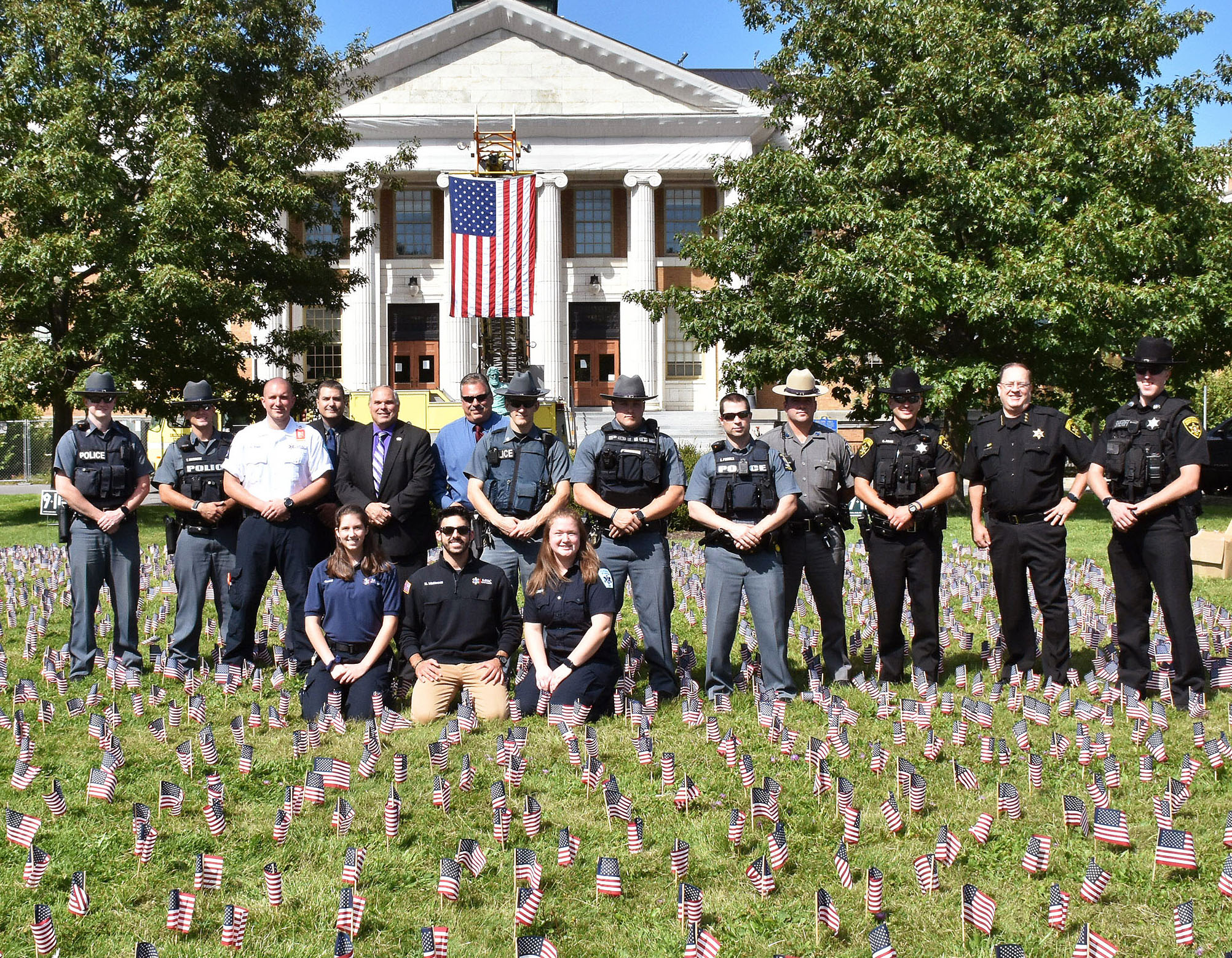 University Police and local law enforcement and first responders participated in this year's effort to plant 2,996 flags in front of Sheldon Hall to remember the lives lost in the Sept. 11, 2001 terrorist attacks. University Police and local law enforcement and first responders participated in this year's effort to plant 2,996 flags in front of Sheldon Hall to remember the lives lost in the Sept. 11, 2001 terrorist attacks.