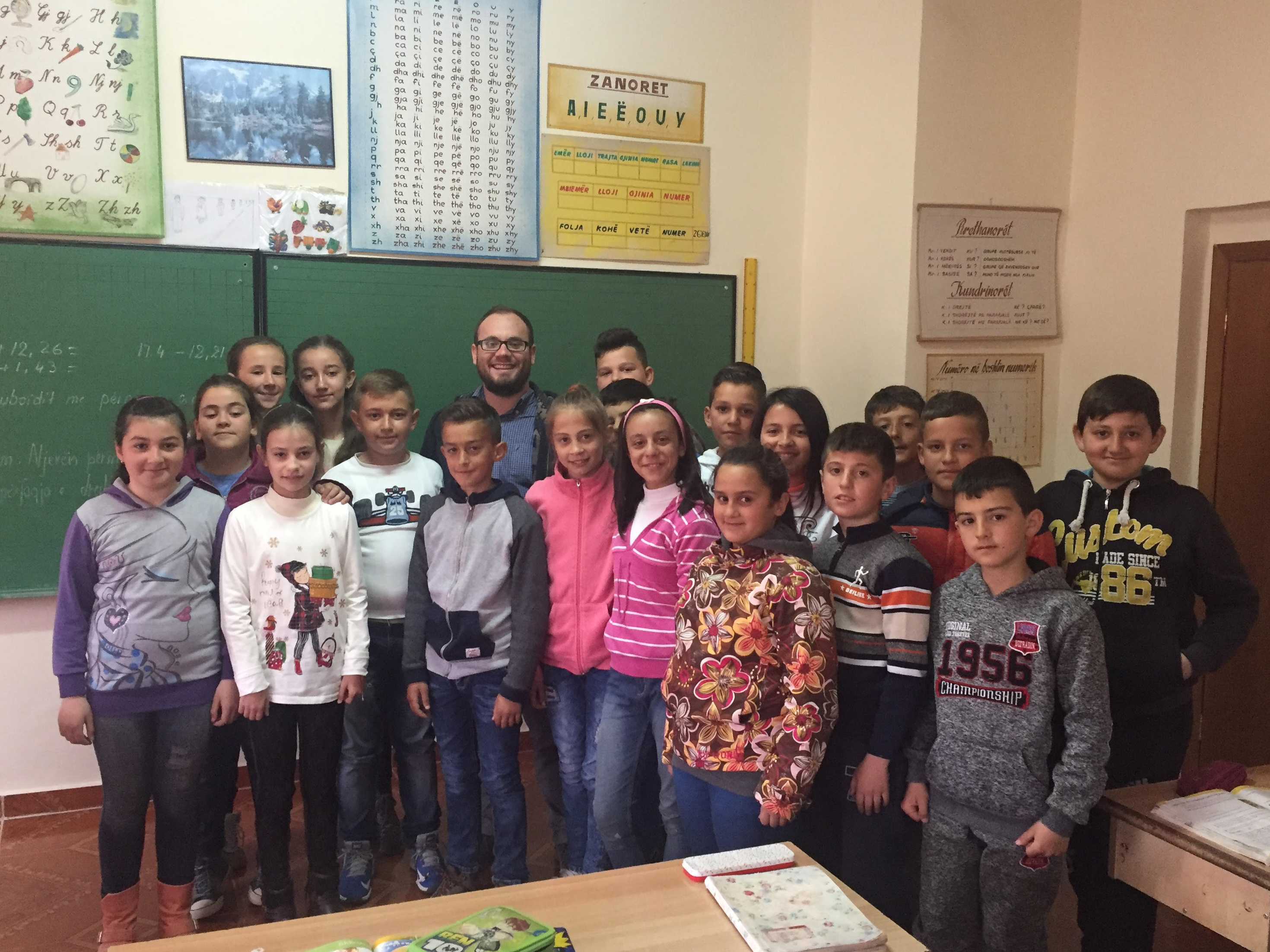Fulbright finalist -- Jesse Corfield, a 2014 Oswego graduate, is among a select group of U.S. citizens chosen to teach abroad in the upcoming academic year through the Fulbright U.S. Student Program. He is shown with some of his students during a recent Peace Corps teaching assignment in Albania.