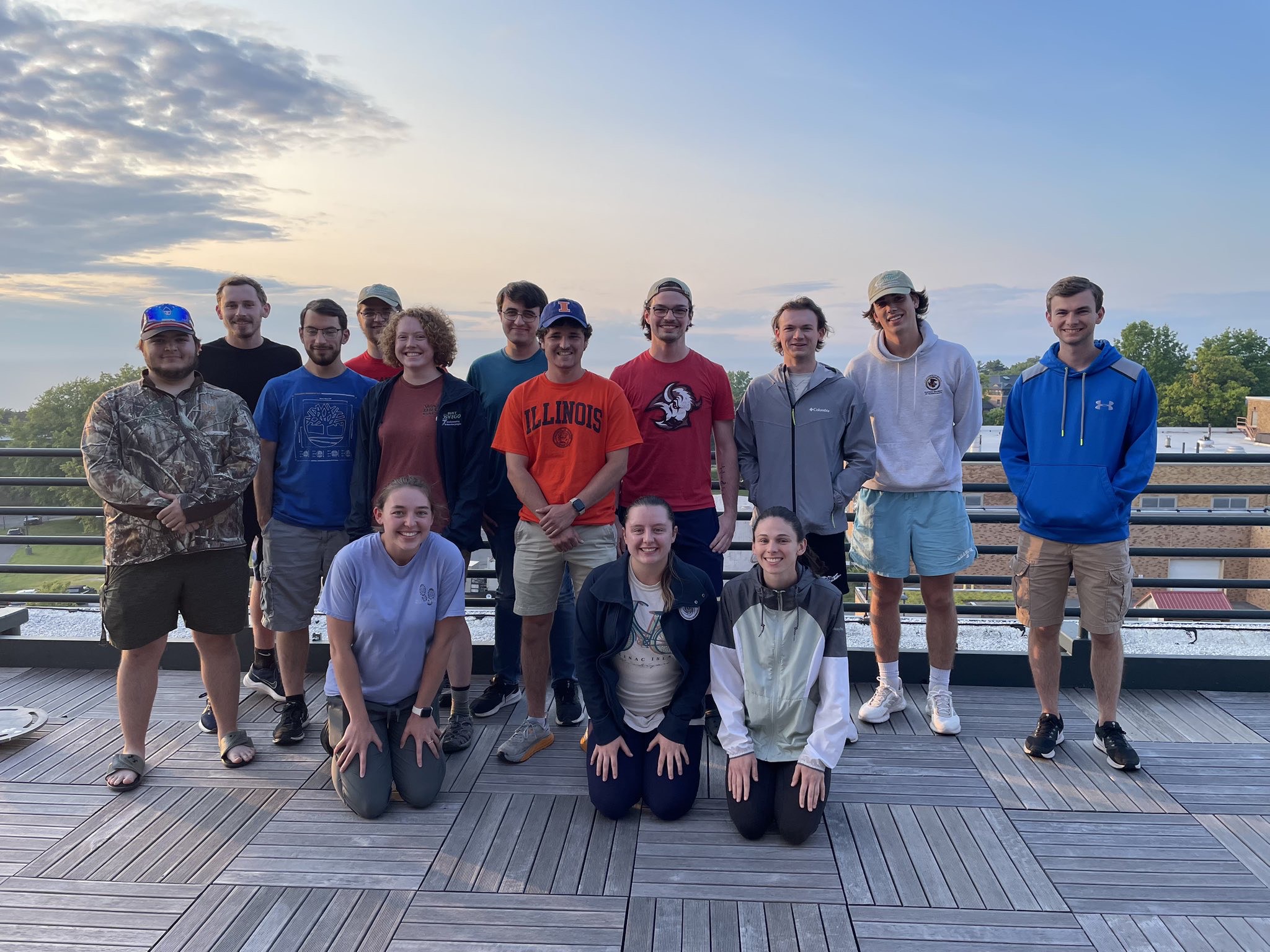 The chasers pose for a sunset picture after returning to Oswego. The chasers pose in front of a sunset for a picture after returning to Oswego.