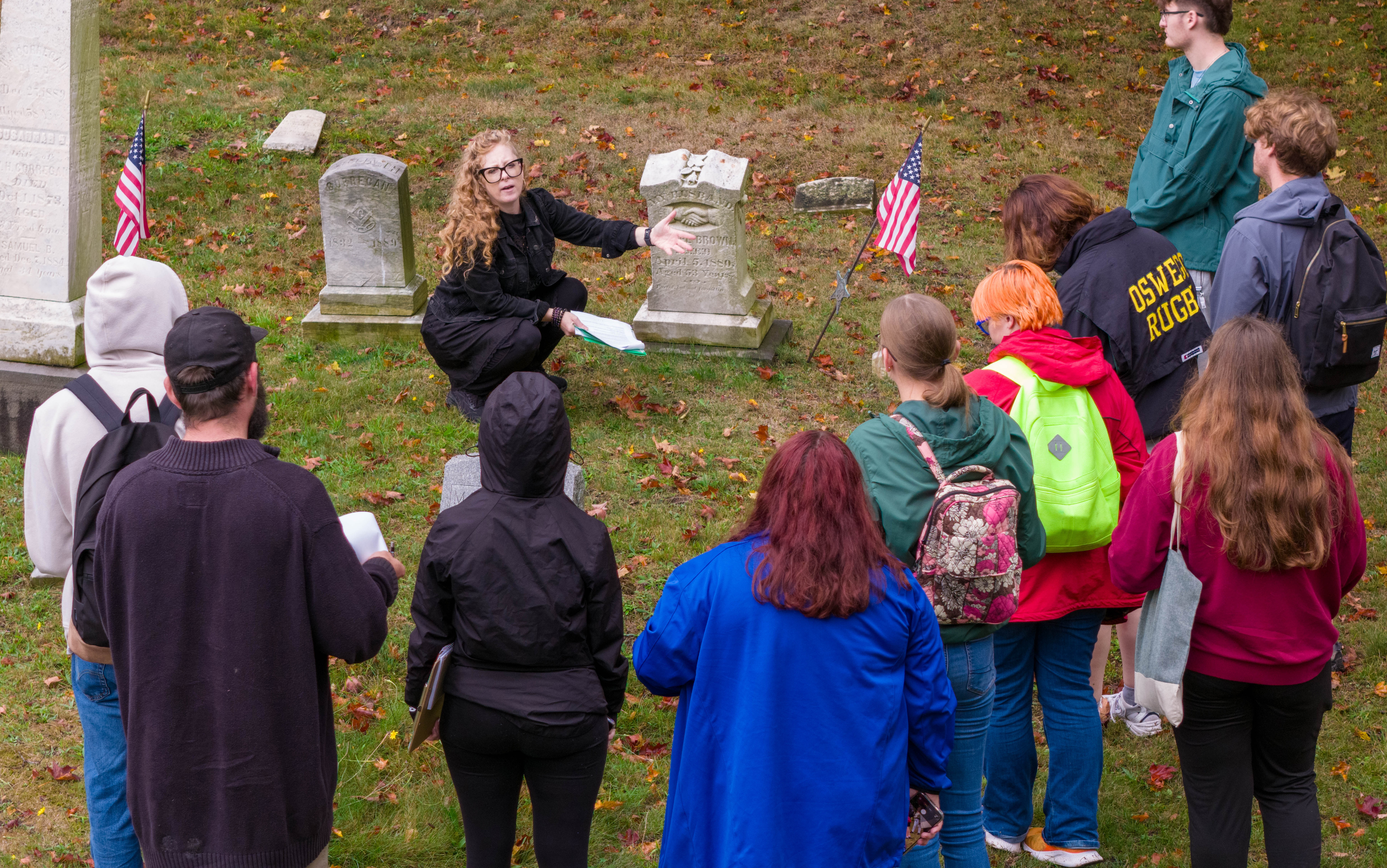 The humanities are alive and well at SUNY Oswego in the new School of Humanities –- part of the College of Liberal Arts, Sciences and Engineering -- joining past, present and future via storytelling and searching for solutions. Here Candis Haak, a history faculty member and director of the new humanities school, teaches her “Death, Data and Local Cemeteries” course at Riverside Cemetery recently.