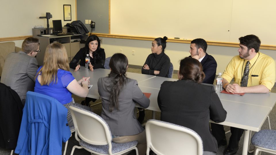 Ferial Govashiri speaking to students