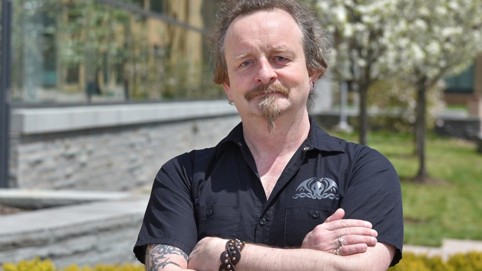 Damian Schofield directs SUNY Oswego's graduate human-computer interaction program