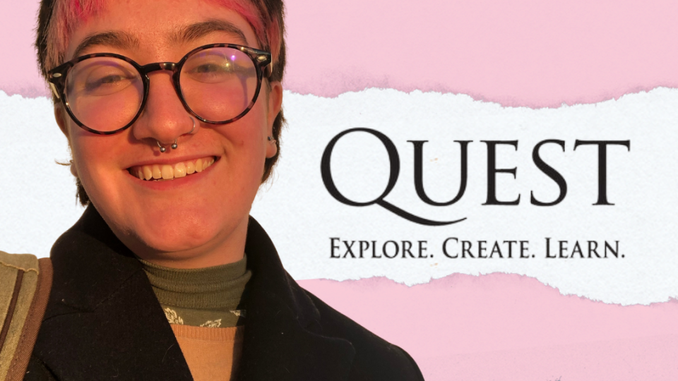 Senior Micah Audycki in front of a trans pride flag for Quest Day presentation