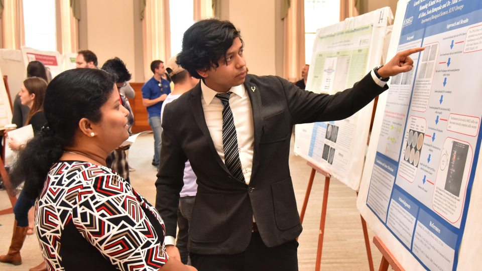 Ali Khan makes a poster presentation