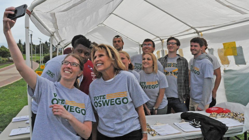Allison Rank, President Stanley and students involved in voter registration project