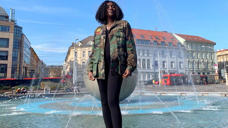 Awa Dembele, a double major in public justice and sociology and a Diversity Study Abroad Mentor, shown during her time studying in the Czech Republic