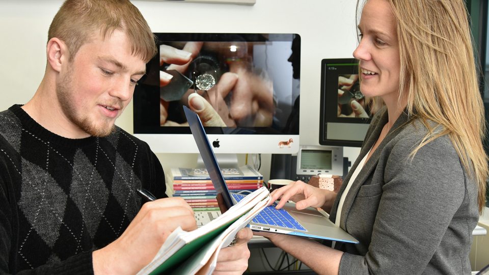 Dr. Lindsay Bell and student Howard Boutelle discuss research on diamond supply chain