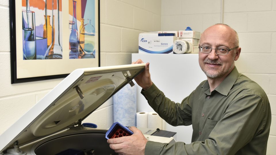 Kestas Bendinskas works with biotech equipment in his new startup