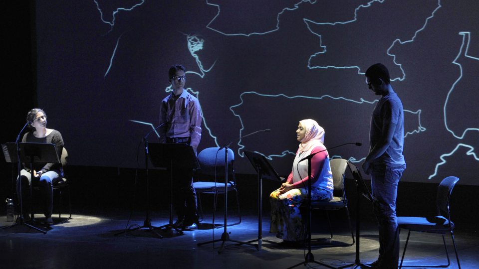 Participants take part in reading onstage for Beyond Sacred performance