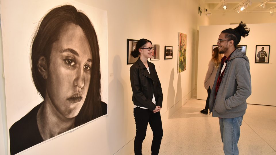 Chelsea Jodway presents her charcoal drawing