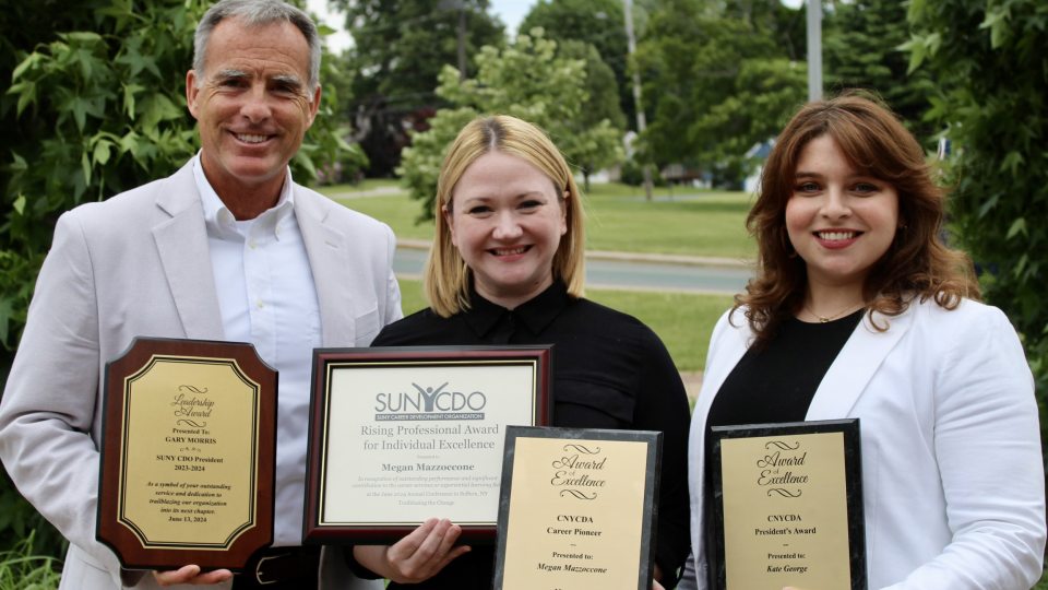From left, Career Services staff members Gary Morris, Megan Mazzoccone and Kate George recently received awards from state organizations