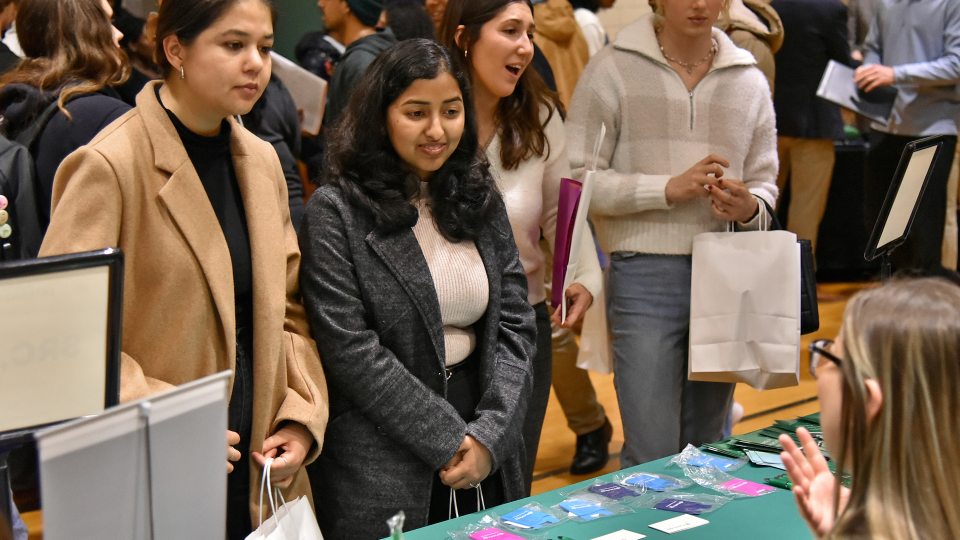 Students speak to employers at the 2024 spring career fair