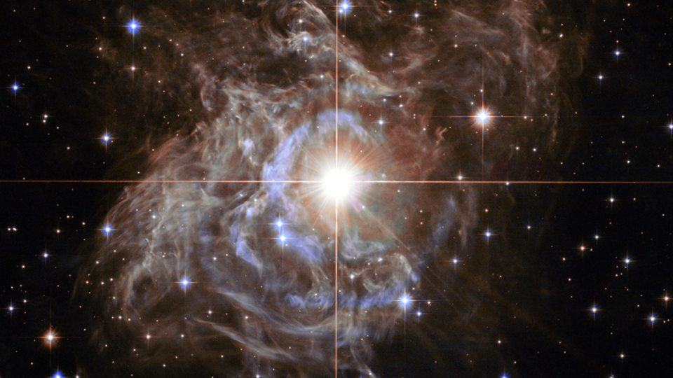 Scientists including SUNY Oswego's Shashi Kanbur use cepheid variable stars like the pulsating RS Puppis (pictured in this NASA image) to try to calculate the size of the universe.
