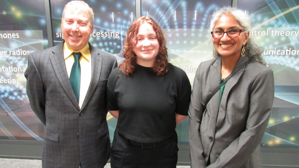 Benefactors Bruce Ellsworth, a 1987 graduate, and Geeta Govindarajoo meet with their chemistry scholarship recipient, Emily Harte this spring in the Shineman Center.