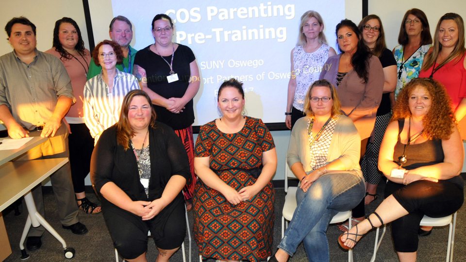 Professor Matt Dykas with large group he's training to become Circle of Security parenting trainers