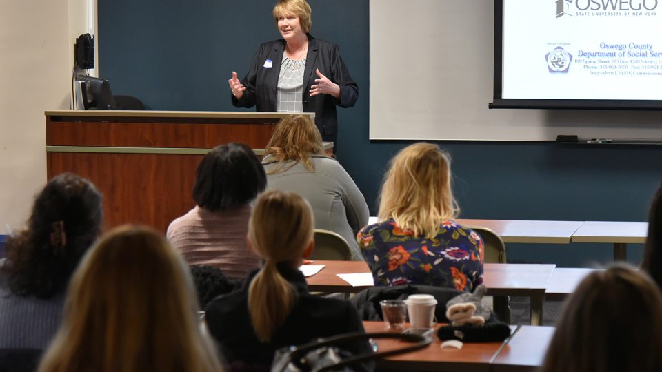 Stacy Alvord, county commissioner of social services, speaks to Circle of Security kickoff event