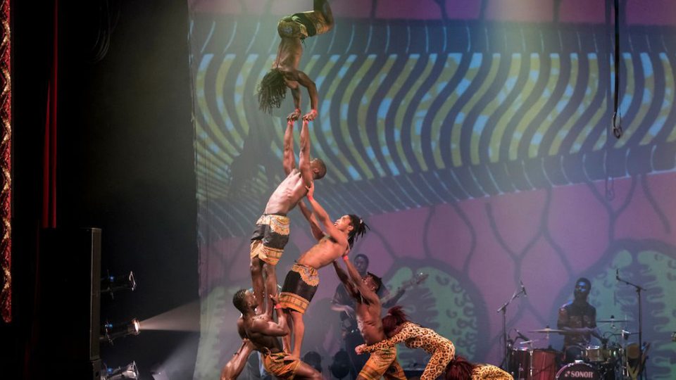 Cirque Kalabante performers stage an amazing acrobatic feat of a man doing a handstand atop a human pyramid