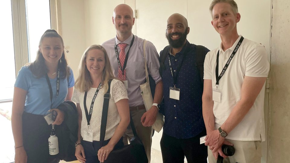 SUNY Oswego criminal justice major Gabrielle Roubanian (at left) had an outstanding opportunity to present research to an international conference at Lisbon, Portugal, in cooperation with faculty member and mentor Marthinus Koen (center)
