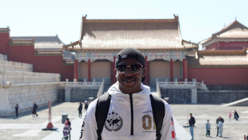 Diandre Coote Anderson studying abroad in China, a country where he now pursues an advanced degree