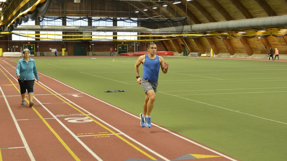 Members of the campus and community run and walk in Romney Field House