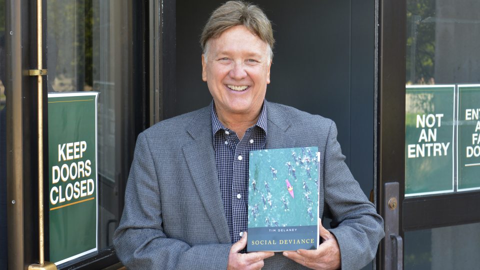 Tim Delaney with book on social deviance