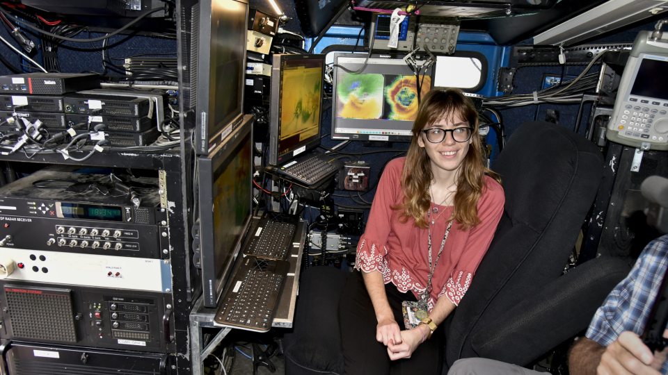 SUNY Oswego will host visit by the Doppler on Wheels high-tech mobile radar vehicle and more for STEM Community Day, from 2 to 5 p.m. on April 6. Samantha Karlsson, now a meteorology grad, sits in the Doppler on Wheels during a 2022 campus visit.