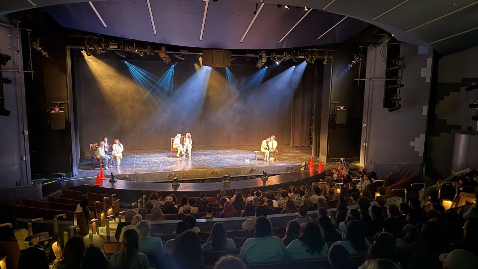 Hundreds of high school students take in a performance in Waterman Theatre during Dramafest