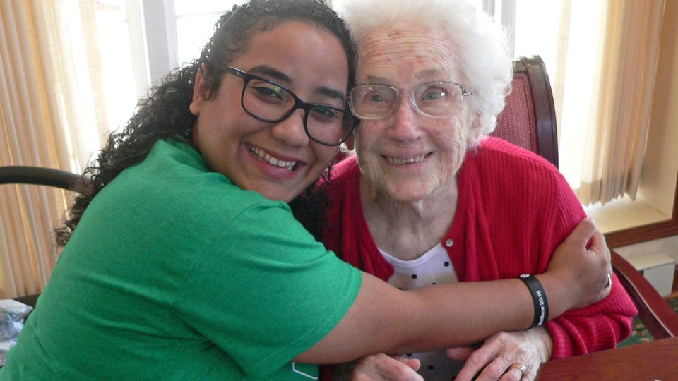 Oswego students doing English immersion program bonded with local Bishop's Commons seniors