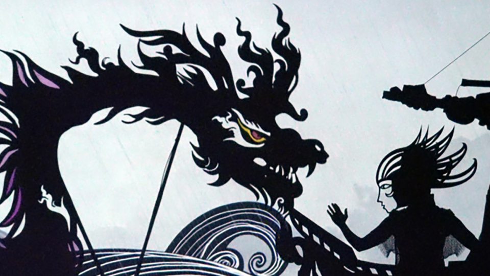 Image of dragon and human prepared for combat