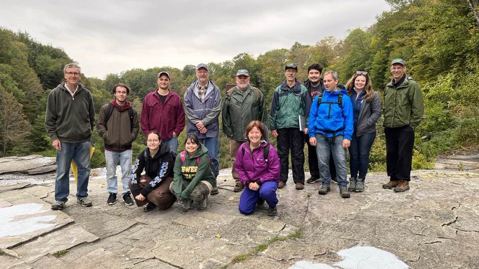 Geologist gather for a group photo during an outing at a recent statewide conference hosted by SUNY Oswego geologists