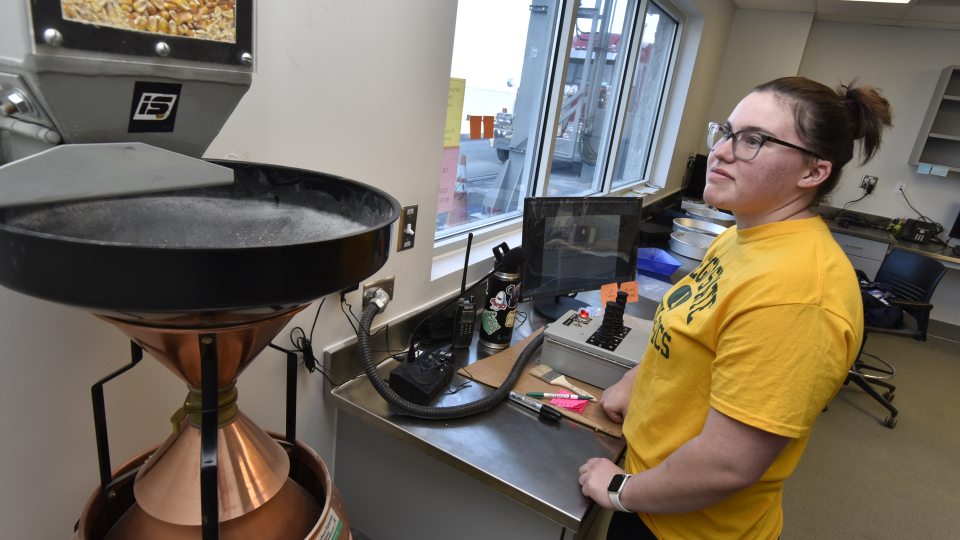 Student lab employee Lindsay Fluman checks samples imported into the new grain lab, a partnership between the Port of Oswego Authority and SUNY Oswego