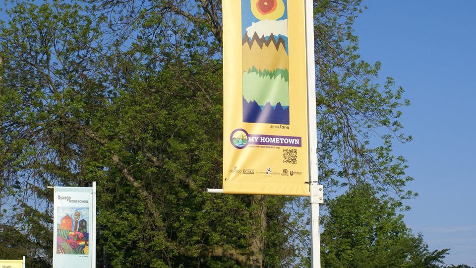 Banners featuring schoolchildren's art near Breitbeck Park