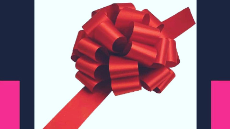 Cover for Heaven Santiago's book Hectic Holidays resembles a shiny gift with a ribbon on it