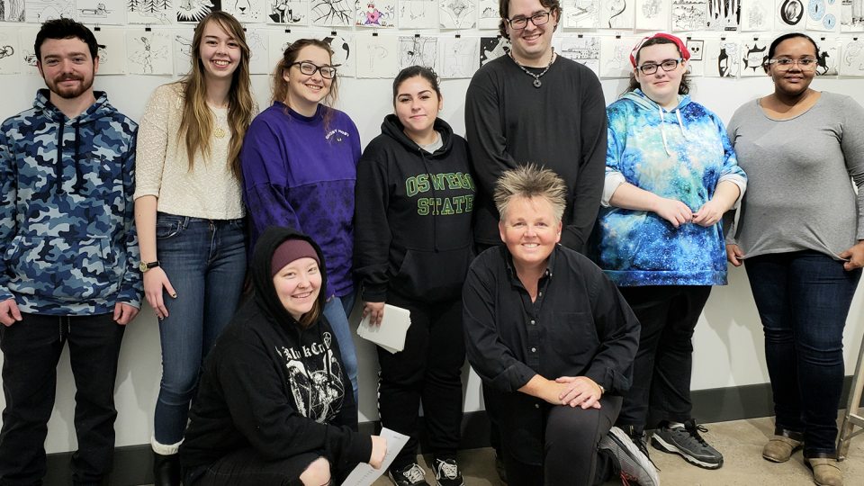 Students participating in Inktober exhibition in 208 Tyler Hall