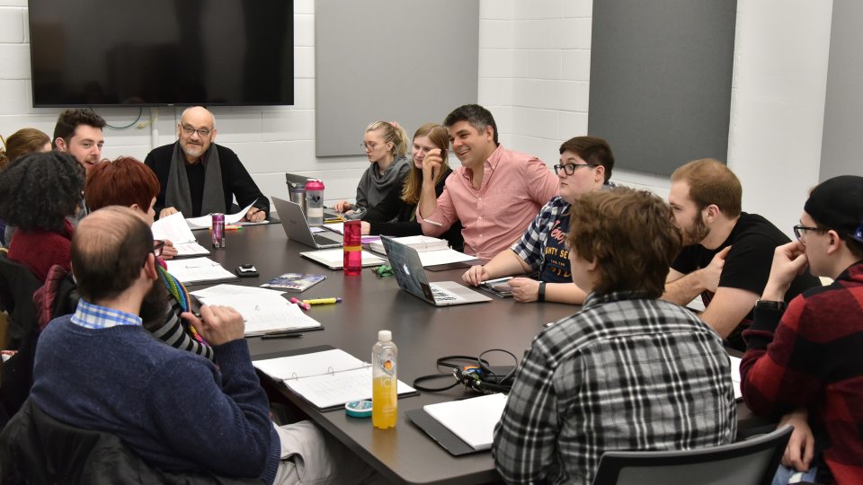 Cast and crew doing a pre-production group reading