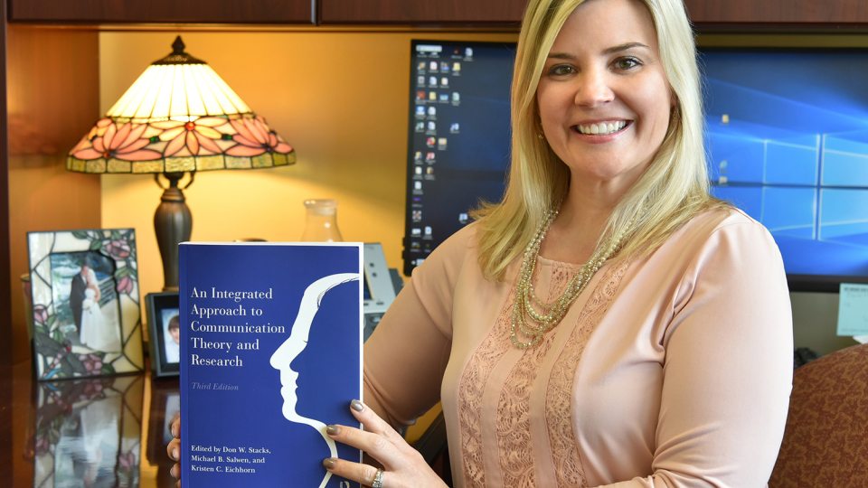 Kristen Eichhorn with revised An Integrated Approach to Communication Theory and Research textbook