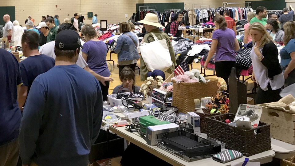 Community members browse for bargains in Leave Green sale