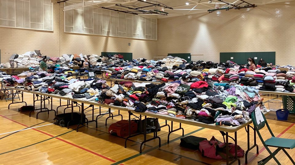 Tables upon tables of clothes fill Swetman Gym during the 2022 OzThrift Sale