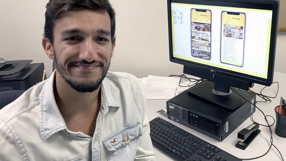 Fabio Machado shows off a prototype of the Charta app