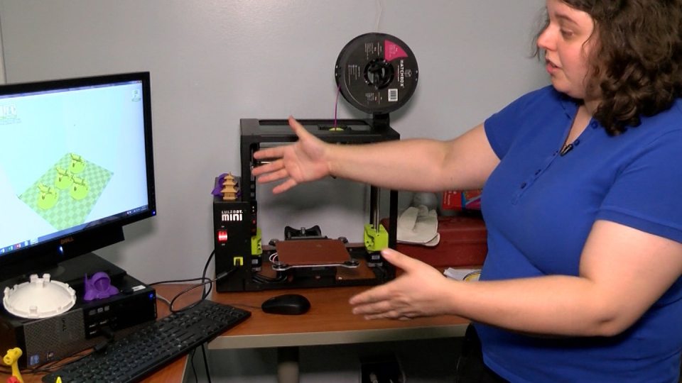 Sharona Ginsberg showing a 3D printer/computer station
