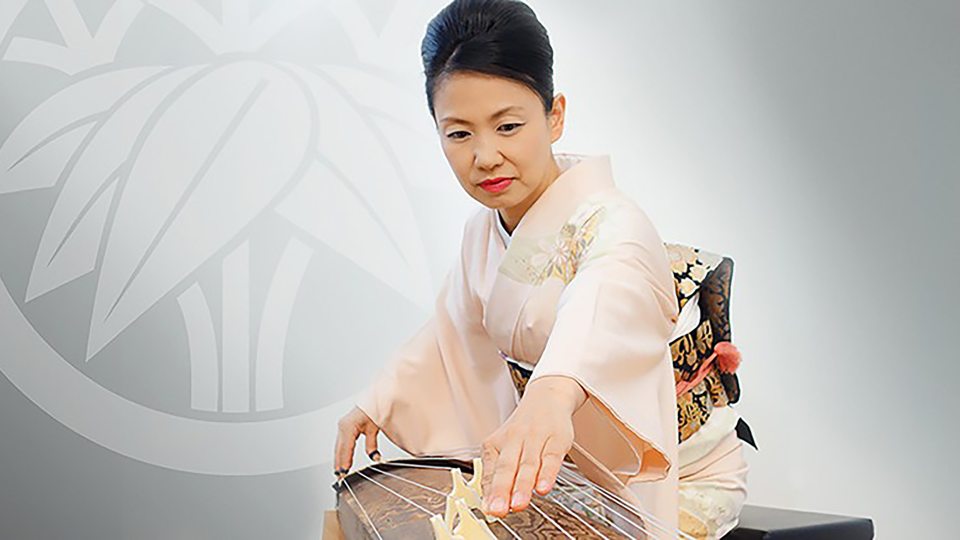 Masayo Ishigure plays a traditional Japanese horizontal harp or zither known as the koto