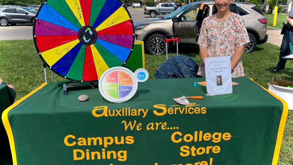 Kathryn Szklany, the registered dietitian for SUNY Oswego Dining Services, did brief nutritional quizzes for prizes during the Mental Health and Wellness Fair