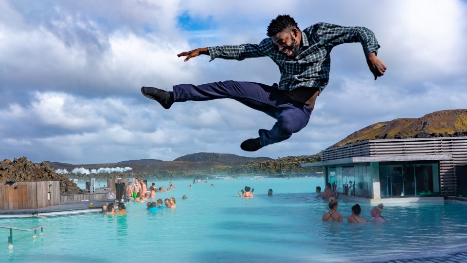 Mic Anthony jumps into the air near Blue Lagoon in Iceland