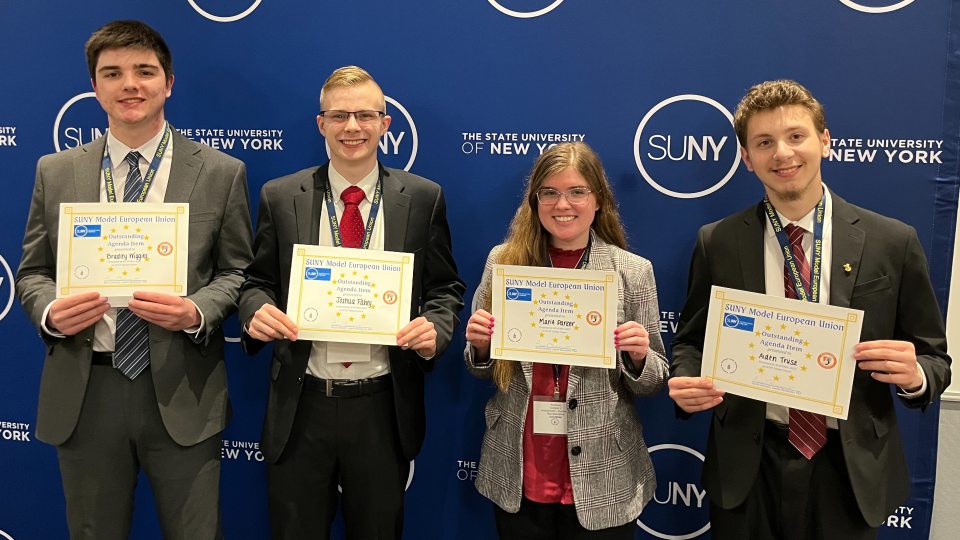 SUNY Oswego students Bradley Wiggins, Joshua Fahey, Marie Park and Aidan Trusz recently excelled in the university's first-ever appearance at the SUNY Model European Union gathering.