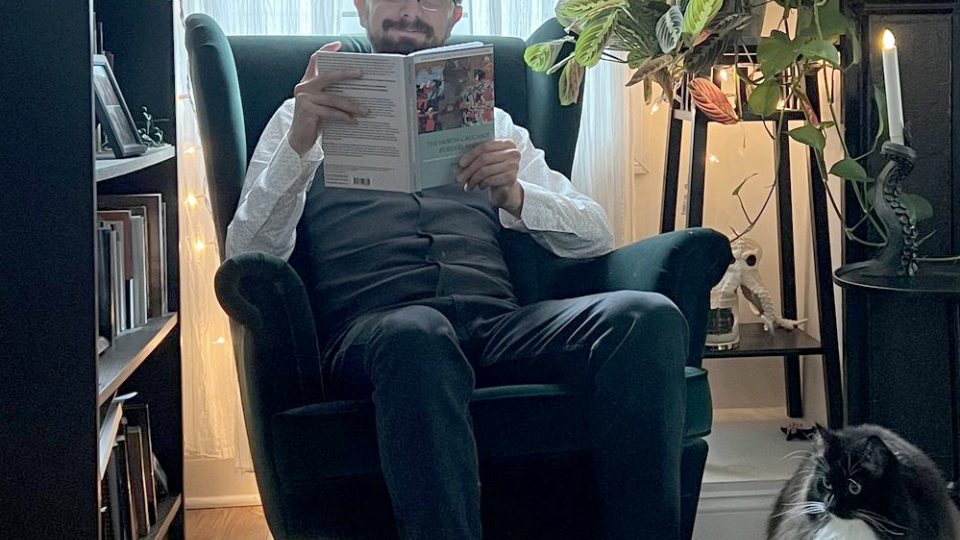 Murat Yasar with a copy of his popular book, “The North Caucasus Borderland Between Muscovy and the Ottoman Empire, 1555-1605"