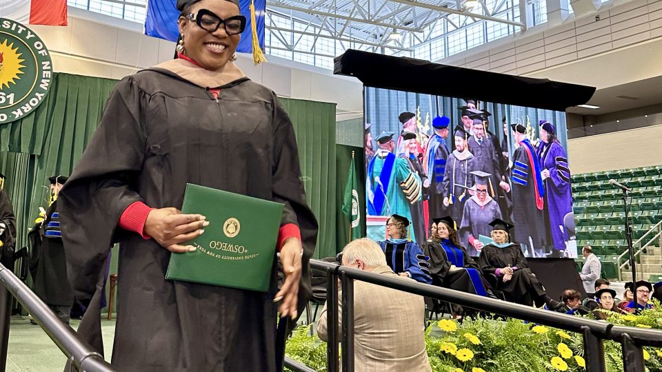 Jane Nwagu walks the ramp at Commencement