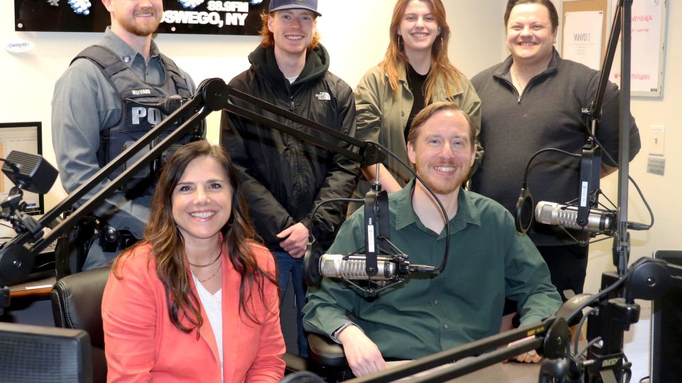 Representatives of WNYO radio, Oswego County Opportunities and University Police gather to prepare for the second 24-hour Radiothon