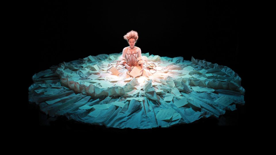 Sylvia Milo -- creator, writer and star of The Other Mozart -- performs in a set that is a large stunning dress