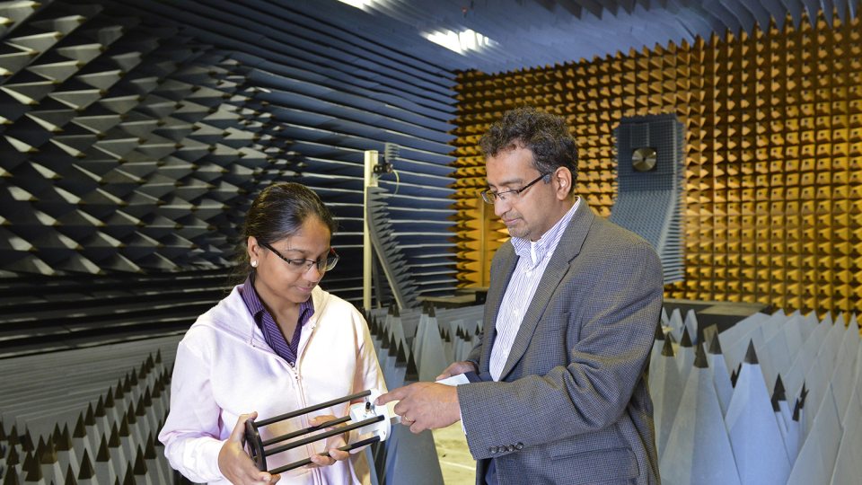 Pat Parimi in anechoic chamber working with Neha Keshan