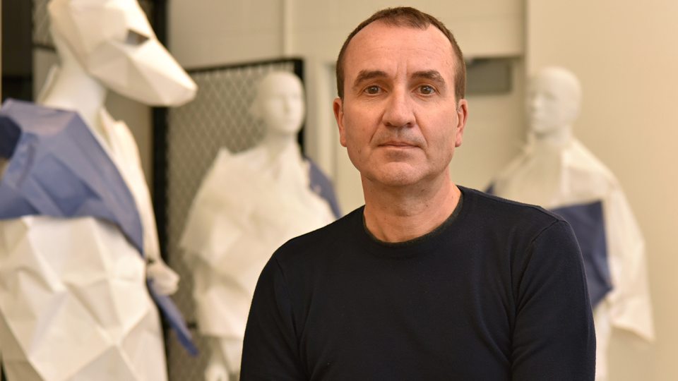 Juan Perdiguero surrounded by creations in his art studio
